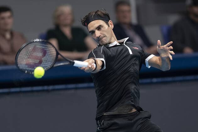 October 14, 2019, Tokyo, Japan: Roger Federer is in his match v John Isner during the UNIQLO Life Wear Day Tokyo charity event at Ariake Coliseum. Professional tennis player Roger Federer who is UNIQLO Global Ambassador took part in a charity event in Tokyo. Federer announced his plans to compete at the Tokyo 2020 Olympics Games. Roger Federer plans to compete in the Tokyo 2020 Olympic Games, Olympische Spiele, Olympia, OS - ZUMAm191 20191014_zap_m191_012 Copyright: xRodrigoxReyesxMarinx