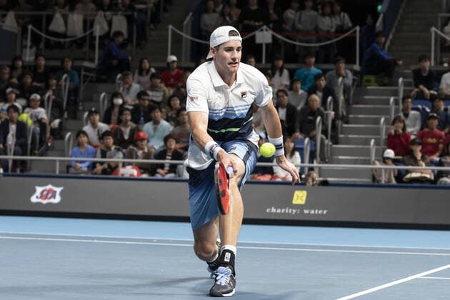 October 14, 2019, Tokyo, Japan: John Isner is in his match v Roger Federer during the UNIQLO Life Wear Day Tokyo charity event at Ariake Coliseum. Professional tennis player Roger Federer who is UNIQLO Global Ambassador took part in a charity event in Tokyo. Federer announced his plans to compete at the Tokyo 2020 Olympics Games. Roger Federer plans to compete in the Tokyo 2020 Olympic Games, Olympische Spiele, Olympia, OS - ZUMAm191 20191014_zap_m191_026 Copyright: xRodrigoxReyesxMarinx