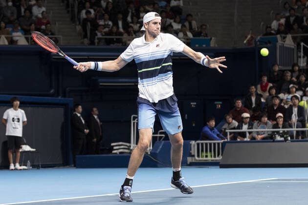 October 14, 2019, Tokyo, Japan: John Isner is in his match v Roger Federer during the UNIQLO Life Wear Day Tokyo charity event at Ariake Coliseum. Professional tennis player Roger Federer who is UNIQLO Global Ambassador took part in a charity event in Tokyo. Federer announced his plans to compete at the Tokyo 2020 Olympics Games. Roger Federer plans to compete in the Tokyo 2020 Olympic Games, Olympische Spiele, Olympia, OS - ZUMAm191 20191014_zap_m191_028 Copyright: xRodrigoxReyesxMarinx