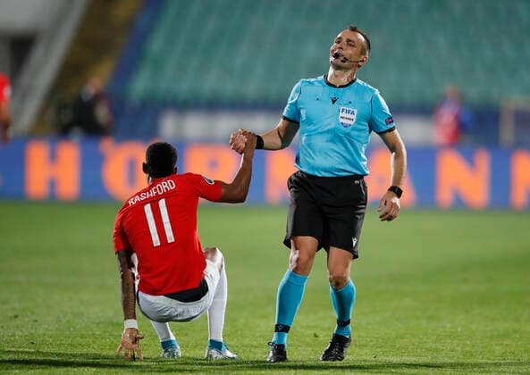 Sport Bilder des Tages Marcus Rashford of England helped up by Referee Ivan Bebek during the UEFA EURO, EM, Europameisterschaft,Fussball 2020 Qualifying match at the Vasil Levski National Stadium, Sofia. Picture date: 14th October 2019. Picture credit should read: David Klein Sportimage EDITORIAL USE ONLY. No use with unauthorised audio, video, data, fixture lists, club league logos or live services. Online in-match use limited to 120 images, no video emulation. No use in betting, games or single club league player publications. SPI-0253-0075