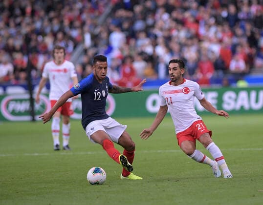 Irfan Can Kahveci of Turkey and Corentin Tolisso 12 of France during the European Championship, EM, Europameisterschaft qualification Group H Match between France and Turkey at Stade de France in Saint-denis , France on October 14 , 2019. 