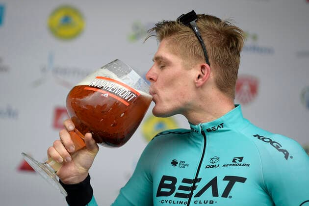 Bilder des Jahres 2019, Sport 10 Oktober Sport Themen der Woche KW42 Sport Bilder des Tages Dutch Piotr Havik of Beat Cycling Club celebrates on the podium with a giant glass of beer after winning the 85th Nationale Sluitingsprijs Putte-Kapellen one day cycling race Tuesday 15 October 2019. YORICKxJANSENS  x05687295x