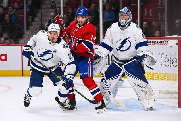 October 15, 2019: Montreal Canadiens center Nick Suzuki (14) tries to maintain his position over Tampa Bay Lightning defenceman Ryan McDonagh (27) during the Tampa Bay Lightning at Montreal Canadiens game at Bell Centre in Montreal, Quebec. CSM NHL, Eishockey Herren, USA 2019: Lightning vs Canadiens OCT 15 - ZUMAc04_ 20191015_zaf_c04_039 Copyright: xDavidxKirouacx
