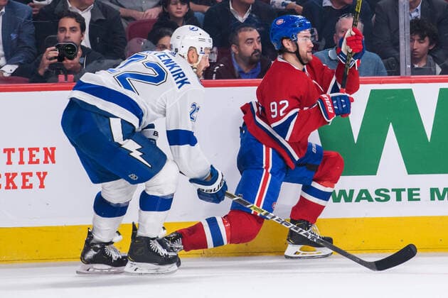 MONTREAL, QC - OCTOBER 15: Kevin Shattenkirk (22) of the Tampa Bay Lightning and Jonathan Drouin (92) of the Montreal Canadiens battle for position during the second period of the NHL, Eishockey Herren, USA game between the Tampa Bay Lighting and the Montreal Canadiens on October 15, 2019, at the Bell Centre in Montreal, QC(Photo by Vincent Ethier Icon Sportswire) NHL: OCT 15 Lightning at Canadiens Icon1910151466