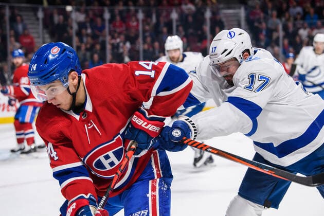 MONTREAL, QC - OCTOBER 15: Alex Killorn (17) of the Tampa Bay Lightning checks Nick Suzuki (14) of the Montreal Canadiens during the second period of the NHL, Eishockey Herren, USA game between the Tampa Bay Lighting and the Montreal Canadiens on October 15, 2019, at the Bell Centre in Montreal, QC(Photo by Vincent Ethier Icon Sportswire) NHL: OCT 15 Lightning at Canadiens Icon1910151710