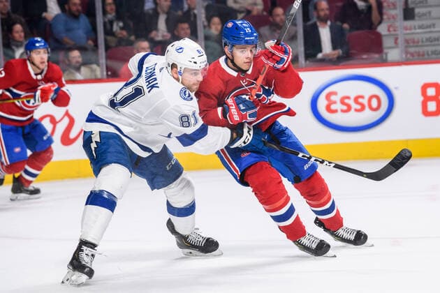 MONTREAL, QC - OCTOBER 15: Erik Cernak (81) of the Tampa Bay Lightning and Jesperi Kotkaniemi (15) of the Montreal Canadiens battle for position during the second period of the NHL, Eishockey Herren, USA game between the Tampa Bay Lighting and the Montreal Canadiens on October 15, 2019, at the Bell Centre in Montreal, QC(Photo by Vincent Ethier Icon Sportswire) NHL: OCT 15 Lightning at Canadiens Icon1910152101