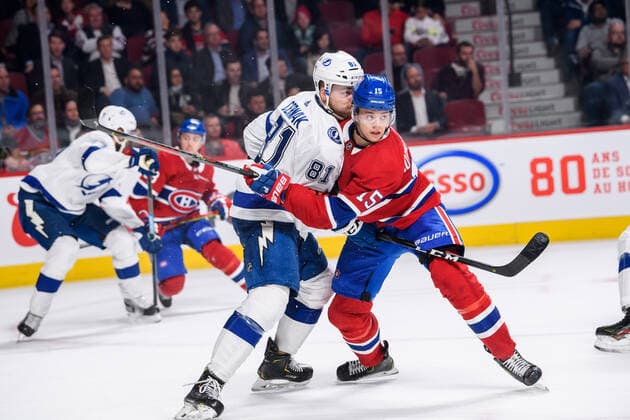 MONTREAL, QC - OCTOBER 15: Erik Cernak (81) of the Tampa Bay Lightning and Jesperi Kotkaniemi (15) of the Montreal Canadiens battle for position during the second period of the NHL, Eishockey Herren, USA game between the Tampa Bay Lighting and the Montreal Canadiens on October 15, 2019, at the Bell Centre in Montreal, QC(Photo by Vincent Ethier Icon Sportswire) NHL: OCT 15 Lightning at Canadiens Icon1910152108