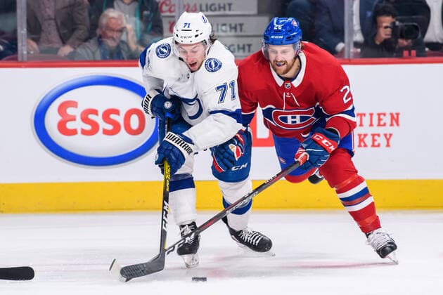 MONTREAL, QC - OCTOBER 15: Jeff Petry (26) of the Montreal Canadiens and Anthony Cirelli (71) of the Tampa Bay Lightning skate for the puck during the third period of the NHL, Eishockey Herren, USA game between the Tampa Bay Lighting and the Montreal Canadiens on October 15, 2019, at the Bell Centre in Montreal, QC(Photo by Vincent Ethier Icon Sportswire) NHL: OCT 15 Lightning at Canadiens Icon1910152301