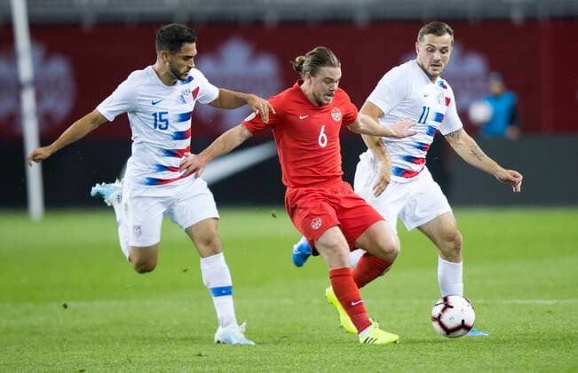 (191016) -- TORONTO, Oct. 16, 2019 -- Samuel Piette (C) of Canada vies with Jordan Morris (R) and Cristian Roldan of the United States during their League A Group A match of the 2019-2020 Concacaf Nations League at BMO Field in Toronto, Canada, Oct. 15, 2019. (Photo by Xinhua) (SP)CANADA-TORONTO-SOCCER-CONCACAF NATIONS LEAGUE-CAN VS USA ZouxZheng 
