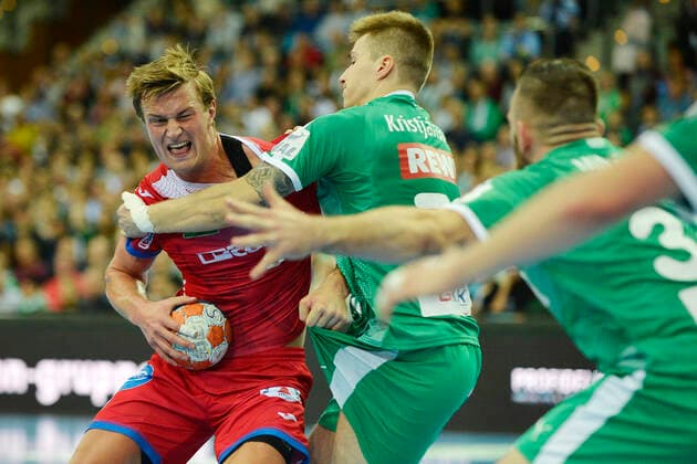LIQUI MOLY Handball Bundesliga 2019 2020, 10 matchday, SC DHfK Leipzig vs. TBV Lemgo Lippe 17 10 2019 Duel for the ball between Jonathan Carlsbogard backspace player Lemgo, back number 9 li and Viggo Kristjansson backspace player DHfK Leipzig, Back number 73 middle as well as Alen Milosevic Circulator DHfK Leipzig, back number 34 right in handball Bundesliga Match Leipzig against TBV Lemgo Lippe 17 10 2019 Leipzig Sachsen Deutschland Arena Leipzig