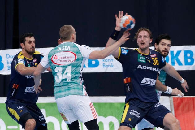 17 10 2019, TUI Arena, Hannover, league game, 1 Bundesliga, TSV Hannover Burgdorf vs. Rhein Neckar Loewen, in picture Morten Olsen 34, Han Burgdorf in duel with Jesper Nielsen 36, Loewen TSV Hannover Burgdorf vs. Rhein Neckar Loewen