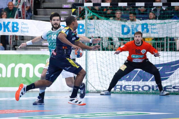 17 10 2019, TUI Arena, Hannover, league game, 1 Bundesliga, TSV Hannover Burgdorf vs. Rhein Neckar Loewen, in picture Evgeni Pevnov 14, Han Burgdorf in duel with Mads Mensah Larsen 22, Loewen TSV Hannover Burgdorf vs. Rhein Neckar Loewen