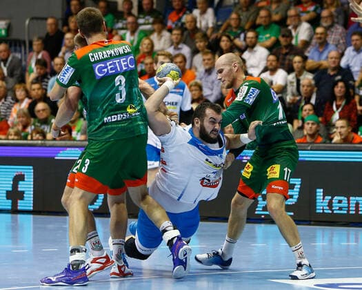 17 10 2019, xtgx, Handball Liqui Moly HBL, SC Magdeburg TVB Stuttgart emspor, v l Piotr Chrapkowski Magdeburg, 3 , Zarko Peshevski Stuttgart, 44 , Tim Hornke Magdeburg, 17 throws goal, scorer, scored goal, scores the goal duel, duel, fight, tackle GETEC Arena