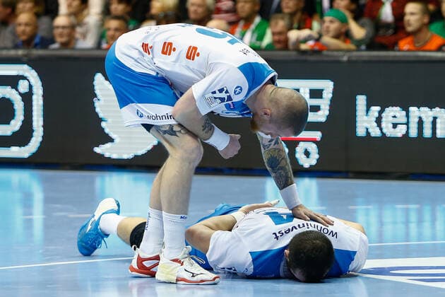17 10 2019, xtgx, Handball Liqui Moly HBL, SC Magdeburg TVB Stuttgart emspor, v l Zarko Peshevski Stuttgart, 44 injured on ground GETEC Arena