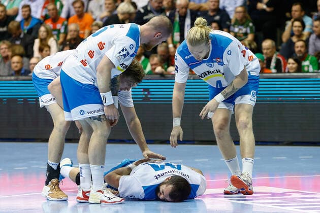 17 10 2019, xtgx, Handball Liqui Moly HBL, SC Magdeburg TVB Stuttgart emspor, v l Zarko Peshevski Stuttgart, 44 injured on ground GETEC Arena