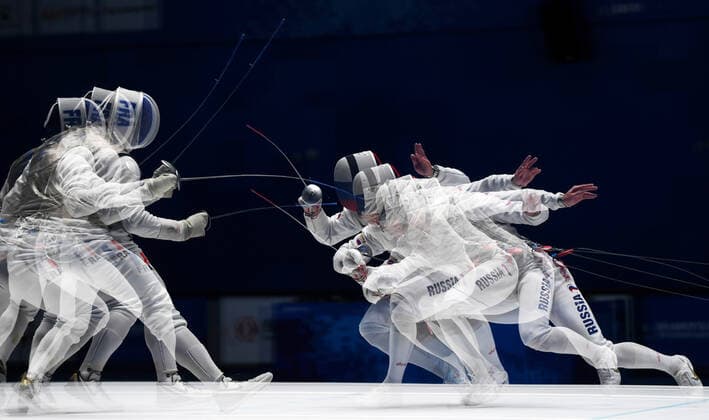 (191020) -- BEIJING, Oct. 20, 2019 -- Timur Safin (R) of Russia competes with Maxime Pauty of France during the men s Individual Foil gold medal bout at the 7th International Military Sports Council (CISM) Military World Games in Wuhan, capital of central China s Hubei Province, Oct. 19, 2019. Timur Safin won the gold medal. ) XINHUA PHOTOS OF THE DAY WangxJianwei 