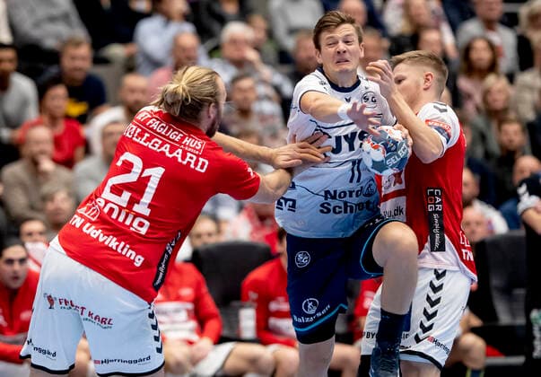Aalborg Handbold meets SG Flensburg Handewitt in a Champions League mens handball match played in Jutlander Bank Arena, Aalborg, Sunday 20 October 2019 Henrik Moellgaard 21 Aalborg and Lasse Svan 11, Aalborg,  Copyright: FotografxRenéxSchütze RenéxSchützex COP107 spdk20191020-175049-L