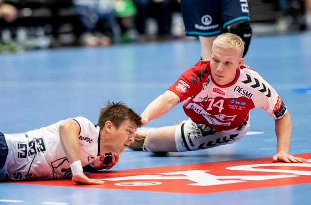 Aalborg Handbold meets SG Flensburg Handewitt in a Champions League mens handball match played in Jutlander Bank Arena, Aalborg, Sunday 20 October 2019 Magnus Saugstrup 14 Aalborg and Lasse Svan 11, Aalborg,  Copyright: FotografxRenéxSchütze RenéxSchützex COP107 spdk20191020-175101-L