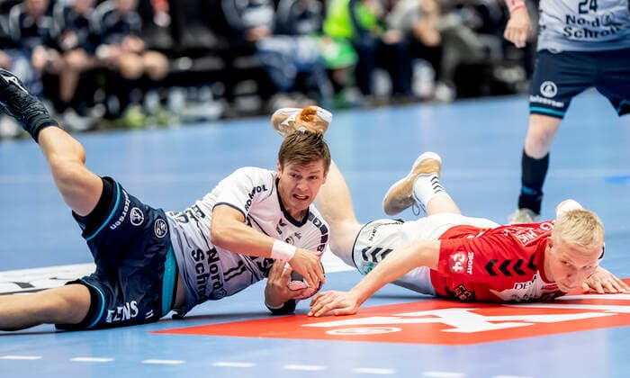 Aalborg Handbold meets SG Flensburg Handewitt in a Champions League mens handball match played in Jutlander Bank Arena, Aalborg, Sunday 20 October 2019 Magnus Saugstrup 14 Aalborg and Lasse Svan 11, Aalborg,  Copyright: FotografxRenéxSchütze RenéxSchützex COP107 spdk20191020-175105-L