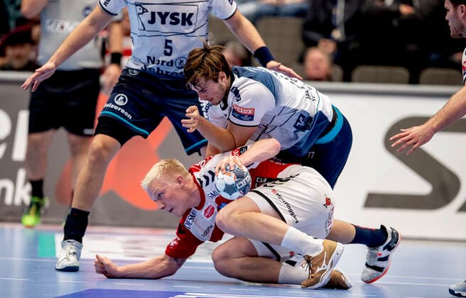 Aalborg Handbold meets SG Flensburg Handewitt in a Champions League mens handball match played in Jutlander Bank Arena, Aalborg, Sunday 20 October 2019 End 31 28 Magnus Abelvik Röd 77 and Magnus Saugstrup 14 Aalborg, Aalborg,  Copyright: FotografxRenéxSchütze RenéxSchützex COP107 spdk20191020-193017-L