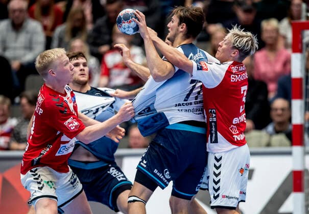 Aalborg Handbold meets SG Flensburg Handewitt in a Champions League mens handball match played in Jutlander Bank Arena, Aalborg, Sunday 20 October 2019 End 31 28 Magnus Saugstrup 14 Aalborg and Janus Smaráson 3 Aalborg has a good grasp of Magnus Abelvik Röd 77, Aalborg,  Copyright: FotografxRenéxSchütze RenéxSchützex COP107 spdk20191020-193121-L