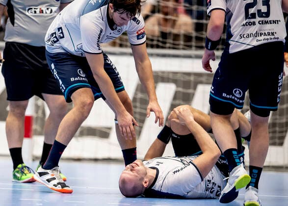 Aalborg Handbold meets SG Flensburg Handewitt in a Champions League mens handball match played in Jutlander Bank Arena, Aalborg, Sunday 20 October 2019 End 31 28 Simon Hald Jensen 5 with possible knee injury, not good for Denmark, Aalborg,  Copyright: FotografxRenéxSchütze RenéxSchützex COP107 spdk20191020-193154-L