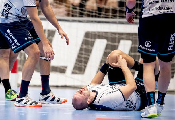 Aalborg Handbold meets SG Flensburg Handewitt in a Champions League mens handball match played in Jutlander Bank Arena, Aalborg, Sunday 20 October 2019 End 31 28 Simon Hald Jensen 5 with possible knee injury, not good for Denmark, Aalborg,  Copyright: FotografxRenéxSchütze RenéxSchützex COP107 spdk20191020-193214-L