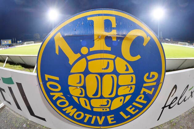Football Regionalliga 2019 2020, 12 matchday, 1 FC Lok Leipzig vs. SV Babelsberg 03 21 10 2019 Logo of 1 FC Lokomotive Leipzig in foreground and zewi floodlight masts with floodlights in front of the regional league match Lok Leipzig vs. SV Babelsberg Leipzig Saxony Germany Bruno Plache Stadium