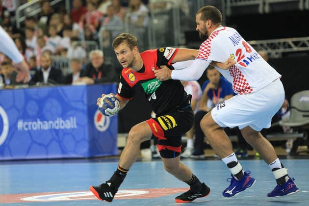 Zagreb, 23.10.2019. - Friendly handball match between Croatia and Germany at the Zagreb Arena. Croatia (white) - Germany (black) 25:26 Fabian BOHM (38) vs Zeljko MUSA (28) 