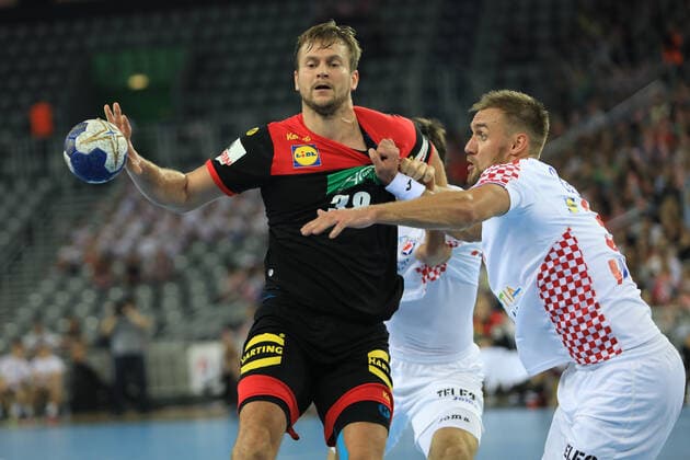 Zagreb, 23.10.2019. - Friendly handball match between Croatia and Germany at the Zagreb Arena. Croatia (white) - Germany (black) 25:26 Fabian BOHM (38) vs Luka CINDRIC (33) 