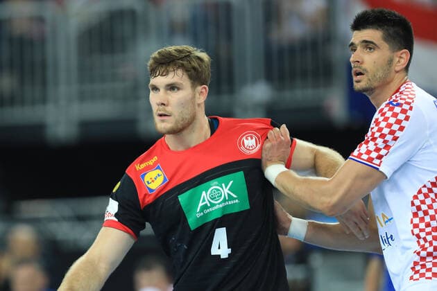 Zagreb, 23.10.2019. - Friendly handball match between Croatia and Germany at the Zagreb Arena. Croatia (white) - Germany (black) 25:26 Johannes GOLLA (4) and Luka STEPANCIC (7) 