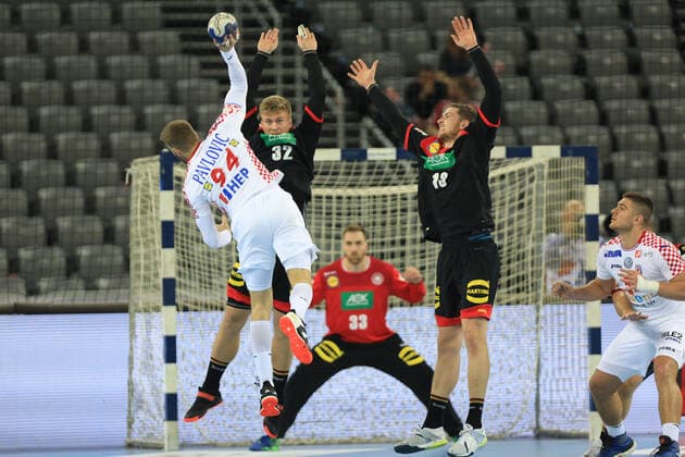 Zagreb, 23.10.2019. - Friendly handball match between Croatia and Germany at the Zagreb Arena. Croatia (white) - Germany (black) 25:26 Domagoj PAVLOVIC (94) vs FRANZ SEMPER (32) and Hendrik PEKELER (13) 