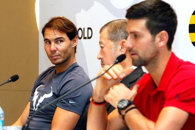 Tennis players Rafael Nadal of Spain (L) and Novak Djokovic of Serbia (R) attend a press conference, PK, Pressekonferenz next to Kazakh businessman Bulat Utemuratov (C), in Nur-Sultan, Kazakhstan, 24 October 2019. Both world champions will face each other on a charity tennis match later today. Nadal and Djokovic present charity match in Nur-Sultan !ACHTUNG: NUR REDAKTIONELLE NUTZUNG!  Copyright: xStanislavxFilippovx GRAF6000 20191024-637075105103239934