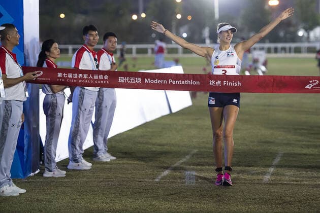 (191024) -- WUHAN, Oct. 24, 2019 -- Clouvel Elodie of France crosses the finish-line during the women s individual laser-run final of Modern pentathlon, moderner Fünfkampf at the 7th CISM Military World Games in Wuhan, capital of central China s Hubei Province, Oct. 24, 2019. ) (SP)CHINA-WUHAN-7TH MILITARY WORLD GAMES-MODERN PENTATHLON XiongxQi 
