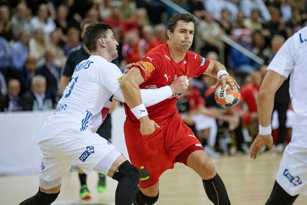 Denmarks Rasmus Lauge Schmidt 11 in match with Frances Ludovic Fabregas 23 during the mens handball match in the Golden League between Denmark and France in Ceres Arena on Thursday, October 24, 2019, Aarhus Denmark,  Copyright: BoxAmstrup BoxAmstrupx cop101 spdk20191024-211634-L