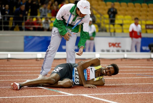 Bilder des Jahres 2019, Sport 10 Oktober Sport Themen der Woche KW43 Sport Bilder des Tages (191026) -- WUHAN, Oct. 26, 2019 -- Amanal Petros of Germany falls down after he crosses the finishing line during the men s 5000m final of track and field at the 7th CISM Military World Games in Wuhan, capital of central China s Hubei Province, Oct. 26, 2019. ) (SP)CHINA-WUHAN-7TH MILITARY WORLD GAMES-TRACK & FIELD WangxLili 