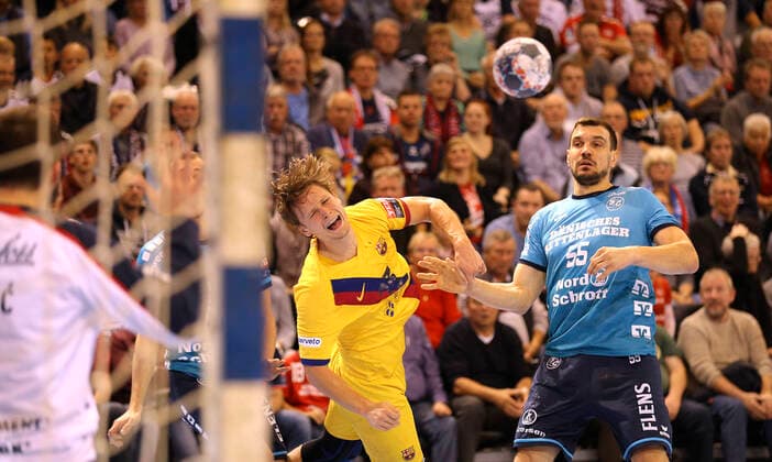 Photo on ball Jure Dolenec Barca against Michal Jurecki Flensburg and left Marvin Lier Handball Men Champions League Mi 30 10 2019 SG Flensburg Barcelona
