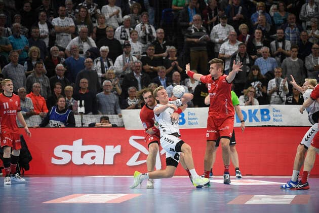 Gisli Thorgeir Kristjansson THW Kiel between Timm Schneider left and Stefan Salger Melsungen , Handball Bundesliga, Liqui Moly HBL, Men, 11 Matchday, THW Kiel vs Melsungen, 31 10 19 Kiel Sparkassen Arena Schleswig Holstein Germany