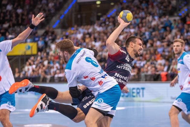Michal Jurecki SG Flensburg Handewitt and Rudolf Faluvegi TVB 1898 Stuttgart Germany, Stuttgart, 02 11 2019, HaBa, BuLi TVB 1898 Stuttgart vs. SG Flensburg Handewitt, Porsche Arena
