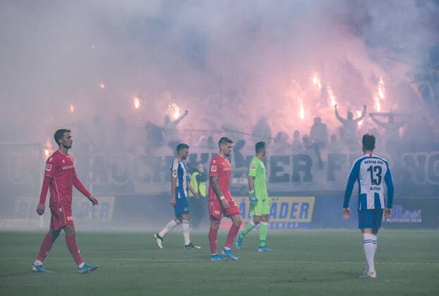 (191103) -- BERLIN, Nov. 3, 2019 -- Fans set fireworks and interrupt the German Bundesliga match between Hertha BSC and Union Berlin in Berlin, capital of Germany, on Nov. 2, 2019. (Photo by Kevin Voigt Xinhua) (SP)GERMANY-BERLIN-SOCCER-BUNDESLIGA-UNION BERLIN VS HERTHA KaixWen¡¤fugete 