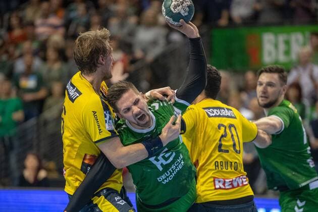 Handball Berlin 03 11 2019 1 Bundesliga HBL Season 2019 2020 Foxes Berlin Rhein Neckar Lions Fabian Wiede Foxes Berlin, No 03 Ilija Abutovic Rhein Neckar, No 20 Jesper Nielsen Rhein Neckar, No 36