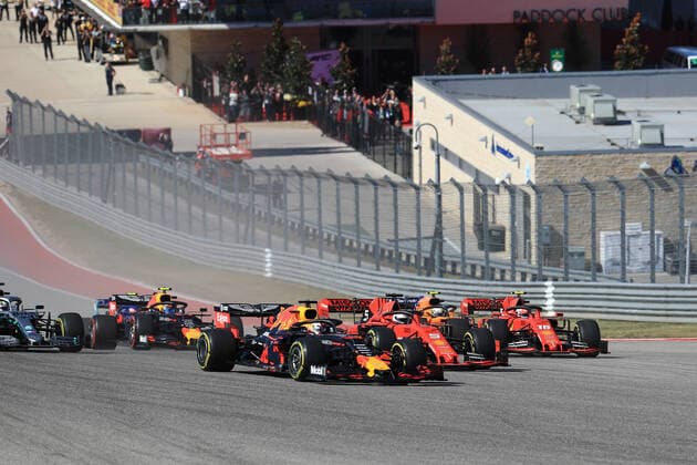 3rd November 2019; Circuit of the Americas, Austin, Texas, United States of America; Formula 1 United Sates Grand Prix, race day; Scuderia Ferrari, Sebastian Vettel and team mate Charles Leclerc are out-manouvefred by the overtake from Aston Martin Red Bull Racing, Max Verstappen as they go three wide into Turn 1  ActionPlus12184358 LeannexBoon