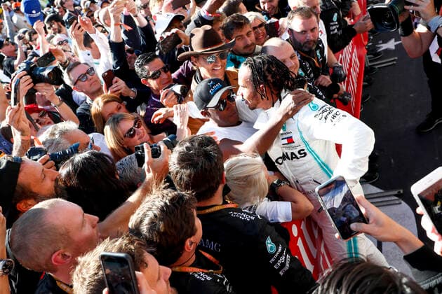 Motorsports: FIA Formula One World Championship, WM, Weltmeisterschaft 2019, Grand Prix of United States, 44 Lewis Hamilton (GBR, Mercedes AMG Petronas Motorsport) celebrates winning the F1 World Drivers Championship 2019 with his father Anthony Hamilton, Linda Hamilton and Matthew McConaughey Austin United States of America