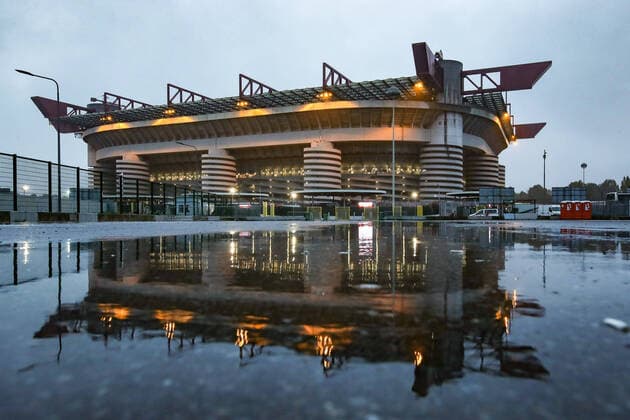 The San Siro stadium reflected in puddles during heavy rainfall before the Serie A match at Giuseppe Meazza, Milan. Picture date: 3rd November 2019. Picture credit should read: Jonathan Moscrop Sportimage EDITORIAL USE ONLY. No use with unauthorised audio, video, data, fixture lists, club league logos or live services. Online in-match use limited to 120 images, no video emulation. No use in betting, games or single club league player publications. SPI-0299-0195