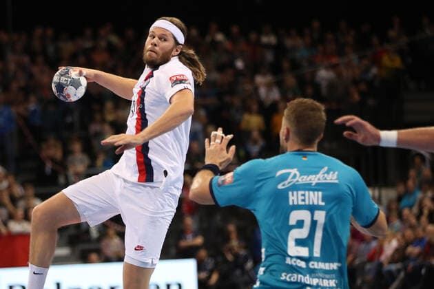 SG Flensburg Handewitt vs. Paris Saint German HB, Handball, EHF Champions League Group Phase, 06 11 19 Flensburg Mikkel Hansen Paris Saint Germain HB, 24 against Jacob Heinl SG Flensburg Handewitt, 21 Copyright: xBEAUTIFULxSPORTS MarioxM.xKobergx