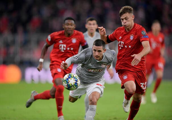 06 11 2019, Football UEFA Champions League 2019 2020, Group stage, 4 matchday, FC Bayern Munich Olympiakos Piraeus, in the Allianz Arena Munich, v li Daniel Podence Olympiakos Piraeus against Joshua Kimmich FC Bayern Munich DFL and DFB regulations prohibit any use of photographs as image sequences and or quasi video