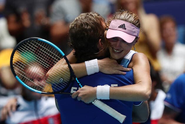 TENNIS FED CUP FINAL, Kristina Mladenovic of France celebrates with Julien Benneteu, team captain of France after winning her match against Ash Barty of Australia on day 2 of the Fed Cup Final tennis competition between Australia and France at RAC Arena in Perth, Saturday, November 10, 2019. ( NO ARCHIVING, EDITORIAL USE ONLY, NO USE IN BOOKS WITHOUT CONSENT PERTH WA AUSTRALIA  Copyright: xGARYxDAYx 20191110001431846791