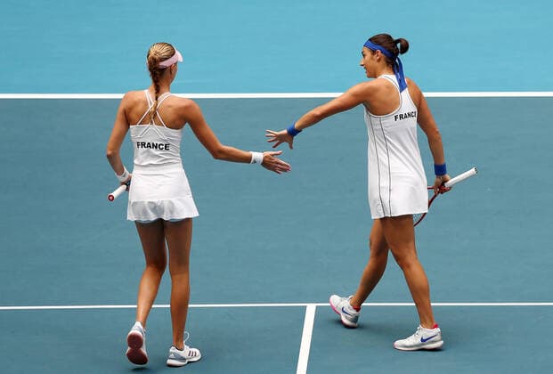 TENNIS FED CUP FINAL, Kristina Mladenovic and Caroline Garcia of France tap hands during the doubles match against Ash Barty and Sam Stosur of Australia on day 2 of the Fed Cup Final tennis competition between Australia and France at RAC Arena in Perth, Saturday, November 10, 2019. ( NO ARCHIVING, EDITORIAL USE ONLY, NO USE IN BOOKS WITHOUT CONSENT PERTH WA AUSTRALIA  Copyright: xGARYxDAYx 20191110001431870729