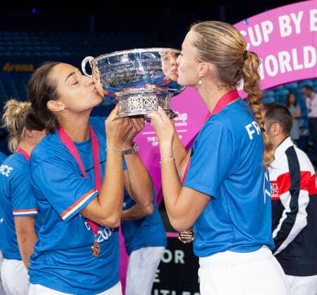 10th November 2019; RAC Arena, Perth, Western Australia, Australia; Fed Cup by BNP Paribas Final Tennis, Australia versus France; Caroline Garcia and Kristina Mladenivic of France kiss the Fed Cup after winning the doubles against Australia - Editorial Use  ActionPlus12186245 DavidxWoodley