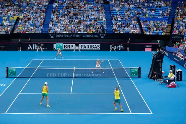 10th November 2019; RAC Arena, Perth, Western Australia, Australia; Fed Cup by BNP Paribas Final Tennis, Australia versus France; Kristina Mladenivic of France plays a volley at the net during the doubles against Australia  ActionPlus12186326 DavidxWoodley